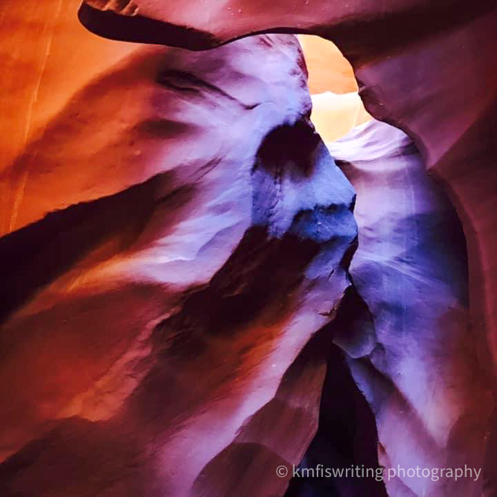 Red sandstone formation in the shape of a Native American chief in Lower Antelope Canyon