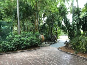 The gardens and grounds of Polydactyl cat and tour guide at Ernest Hemingway Home and Museum
