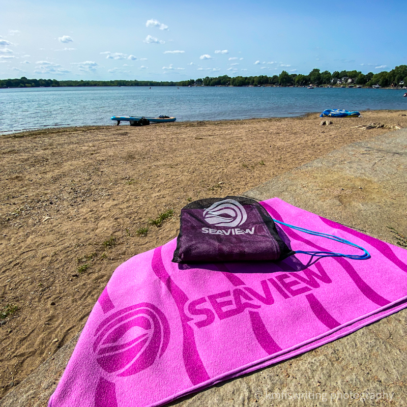 Purple eco friendly beach towel at Lake Marion