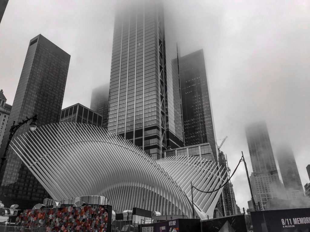Foggy image of the 911 Memorial and Museum and One World Observatory; New York City, New York
