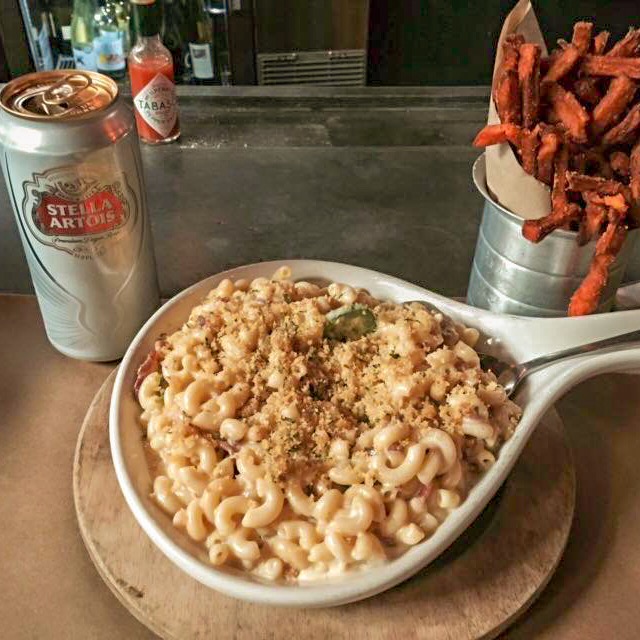 mac and cheese with a can of beer and sweet potato fries