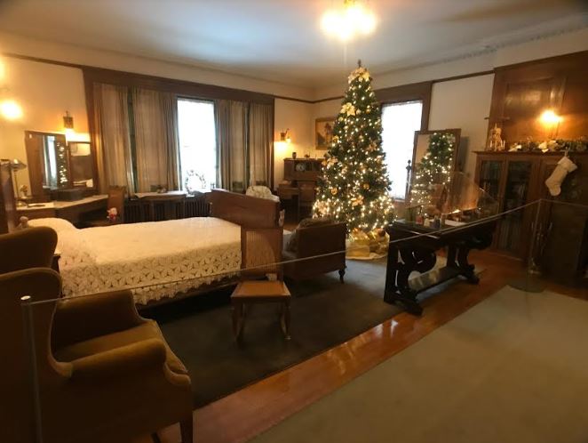 Bedroom with a Christmas tree