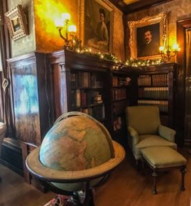 Glensheen Mansion globe and bookshelves