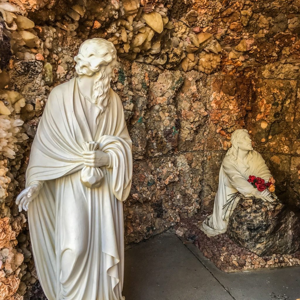 Statues of Judas and Jesus the night before betrayal Grotto of the Redemption