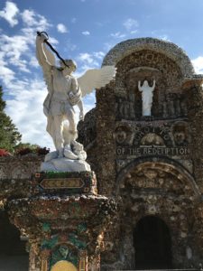 Statue of St. Michael stepping on the devil at Grotto of the Redemption