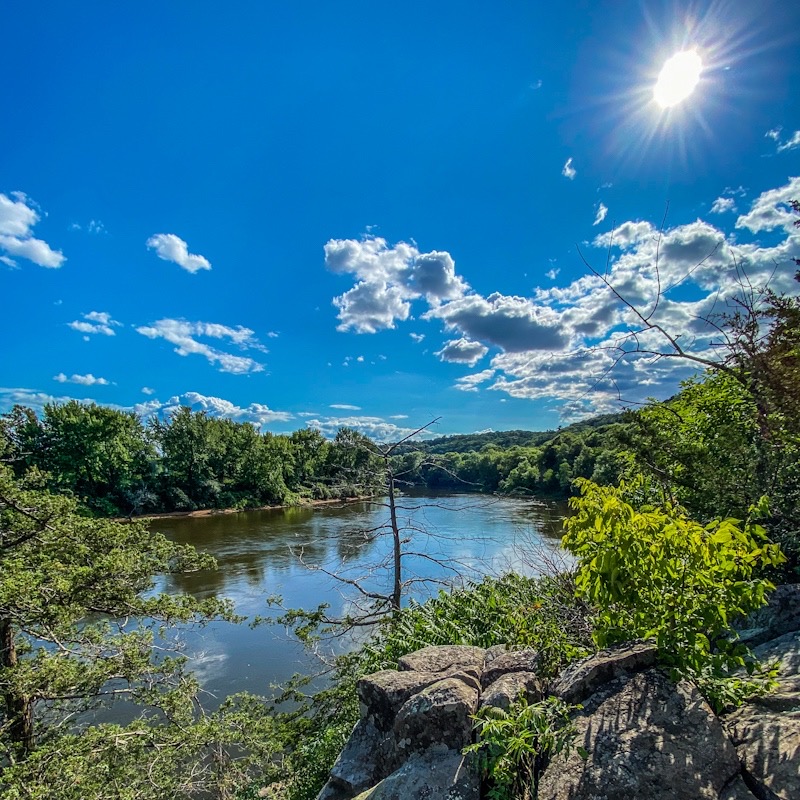 Scenic view of a river, bluffs and trees