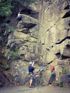 Couple rock climbing