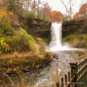 Minnehaha Falls waterfalls with autumn leaves