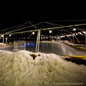 Outdoor ice skating rink at night