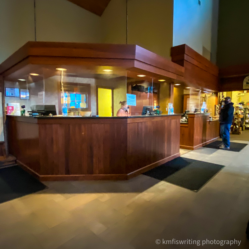 Hotel lobby receptionist desk with plexiglass