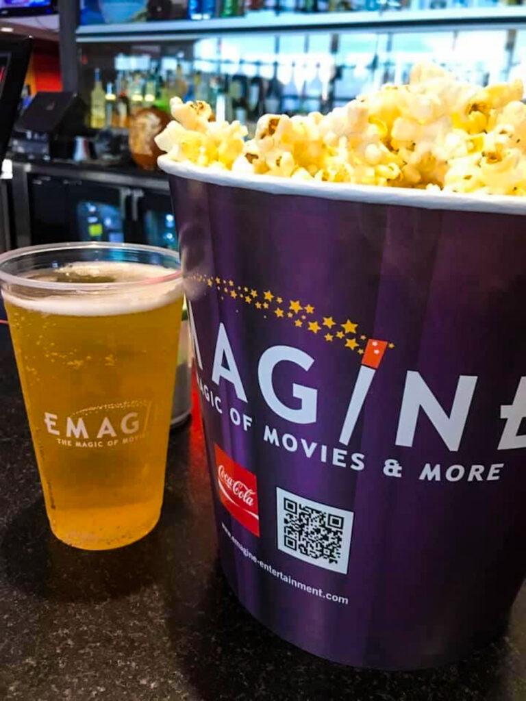 Beer and a bucket of popcorn at the movie theater