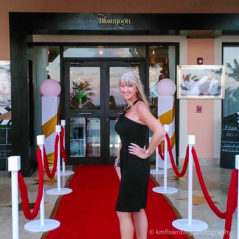 Woman standing on a red carpet
