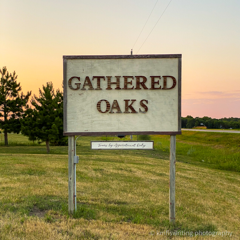 Gathered Oaks sign grain bin suites