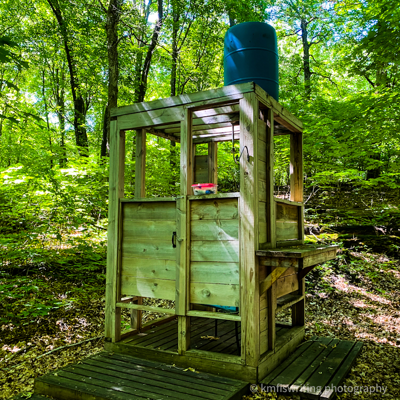 Outdoor shower at near Glendalough State Park in Minnesota in the woods