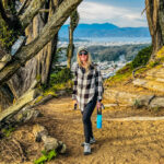 Hiker holding water bottle at Golden Gate Heights Park in San Francisco