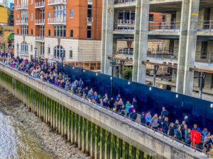 The queue for Queen Elizabeth II lying in state in London England along the River Thames
