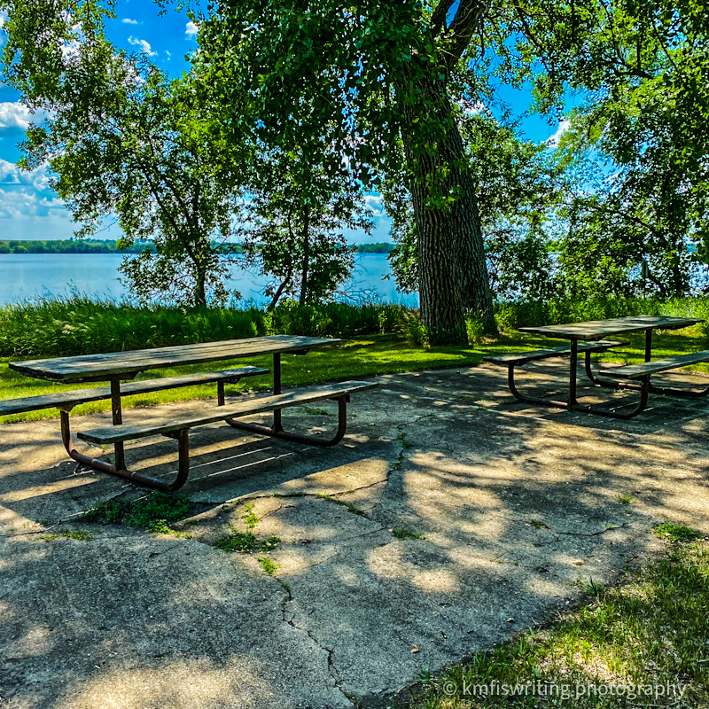 Picnic tables next to lake at Big Stone Lake State Park in Minnesota