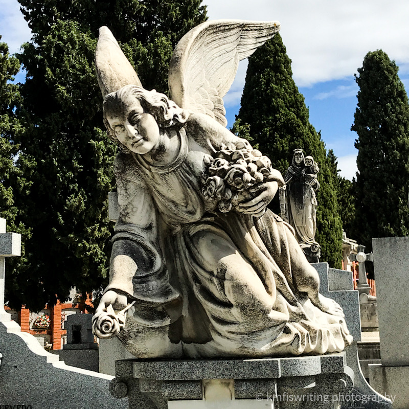Angel statue sculpture at Our Lady of Almudena Cemetery in Madrid,Spain