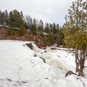 Winter hiking and frozen waterfalls in Minnesota at Gooseberry Falls State Park